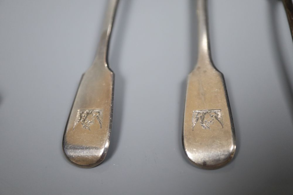 A group of small silverware including small waiter, three condiments, ashtray and minor flatware.